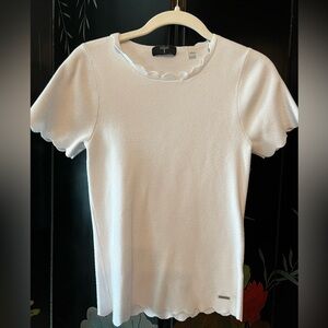 Tahari top in soft, form-fitting cotton with scalloped detail. Good condition